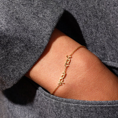 Vocabulary bracelet, gold plated